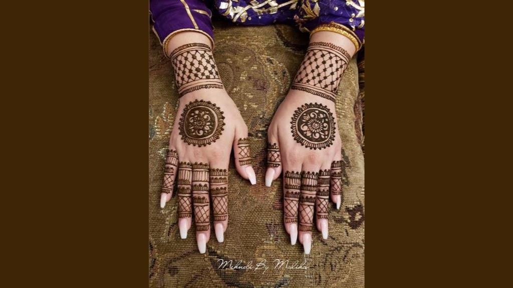intricate mandala inspired henna design